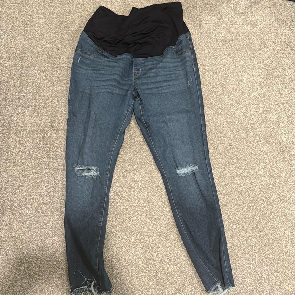 Maternity distressed skinny blue jeans. Over stomach support.